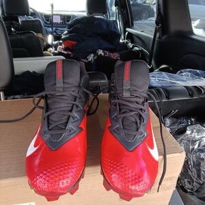 Nike Red Football Cleats with Black Accents